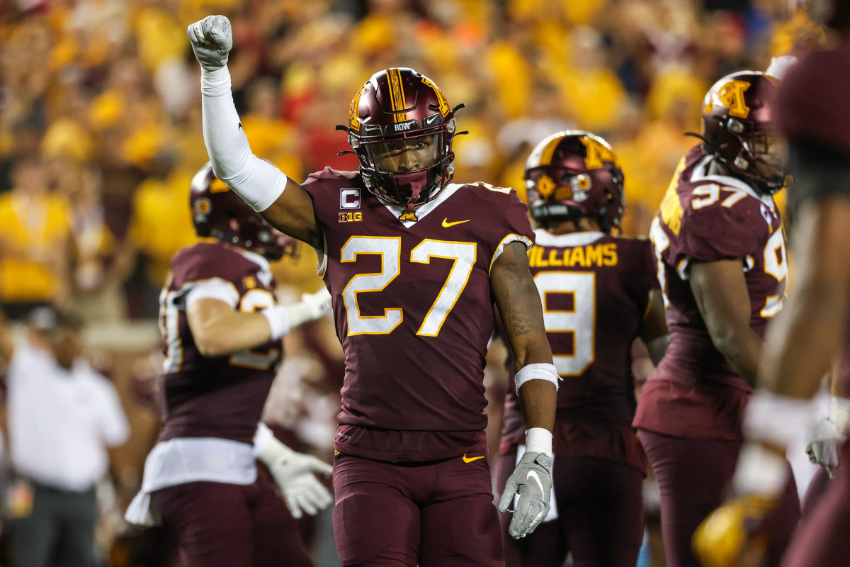 Tyler Nubin raises a fist in celebration